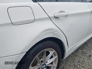 2010 BMW 3 Series 328i with VIN WBAPH7G59ANM52662, listed as a IAAI auction lot 42170338 with 163,648 mi miles and . Bid and sale history available at carsss.com. Image 6.