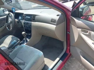 2007 Toyota Corolla CE z VIN JTDBR32E570111498, wystawiony jako IAAI lot #42417995 z przebiegiem 299 999 mil mil oraz . Historia ofert i sprzedaży dostępna na DreamBid. Obrazek 5.