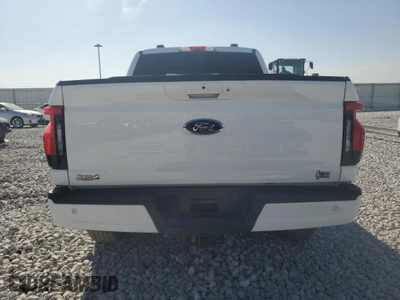 2023 Ford F-150 Lightning Pro z VIN 1FT6W1EV3PWG34249, wystawiony jako Copart lot #46901535 z przebiegiem 9 389 mil mil oraz Szkoda całkowita • Salvage title. Historia ofert i sprzedaży dostępna na DreamBid. Obrazek 6.