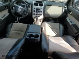 2010 Mercury Mariner Premier with VIN 4M2CN8HG5AKJ00531, listed as a Copart auction lot 68167794 with 184,969 mi miles and Salvage Title. Bid and sale history available at carsss.com. Image 8.