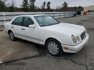 1996 Mercedes-Benz E-Class with VIN WDBJF55F5TJ022277, listed as a Copart auction lot 52597985 with 213,848 mi miles and Clean Title. Bid and sale history available at carsss.com. Image 4.