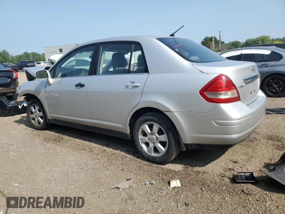 2007 Nissan Versa SL with VIN 3N1BC11E87L401537, listed as a Copart auction lot 60481435 with 383,005 mi miles and Salvage title. Bid and sale history available at DreamBid. Image 2.