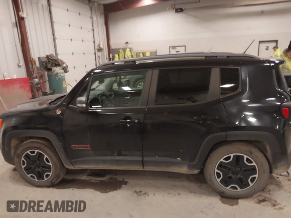 2015 Jeep Renegade Trailhawk with VIN ZACCJBCT7FPB35801, listed as a IAAI auction lot 41991084 with 119,887 mi miles and . Bid and sale history available at DreamBid. Image 14.