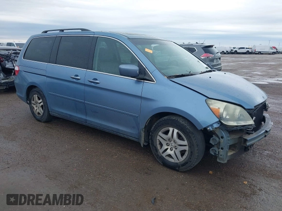 2007 Honda Odyssey EX-L z VIN 5FNRL38647B139018, wystawiony jako IAAI lot #41712602 z przebiegiem 243 473 mil mil oraz . Historia ofert i sprzedaży dostępna na DreamBid. Obrazek 1.