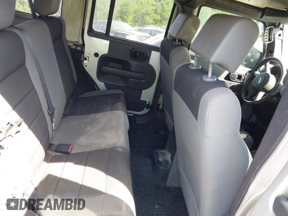 2007 Jeep Wrangler Unlimited X with VIN 1J4GA39137L114943, listed as a IAAI auction lot 42080263 with Not provided miles and . Bid and sale history available at DreamBid. Image 8.