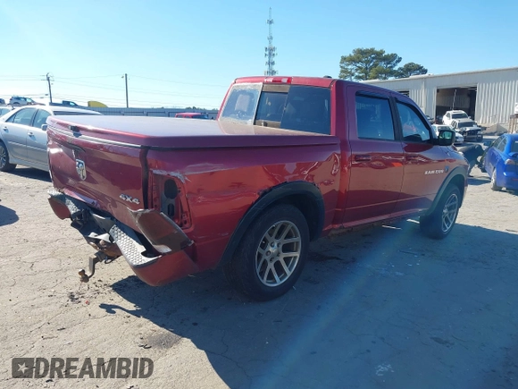 2011 Ram 1500 Big Horn with VIN 1D7RV1CT0BS623605, listed as a IAAI auction lot 41278351 with 198,313 mi miles and . Bid and sale history available at DreamBid. Image 4.