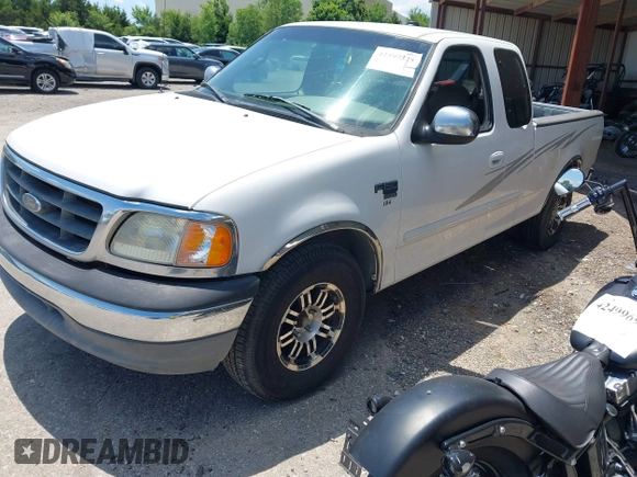 2000 Ford F-150 XL z VIN 1FTRX17L7YKA82690, wystawiony jako IAAI lot #42597325 z przebiegiem Nie podano mil oraz . Historia ofert i sprzedaży dostępna na DreamBid. Obrazek 2.