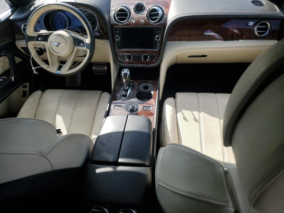 2017 Bentley Bentayga W12 z VIN SJAAC2ZV1HC014037, wystawiony jako Copart lot #73797634 z przebiegiem Nie podano mil oraz Szkoda całkowita • Salvage title. Historia ofert i sprzedaży dostępna na DreamBid. Obrazek 8.