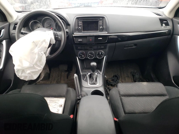 2014 Mazda CX-5 Touring z VIN JM3KE4CY1E0406726, wystawiony jako Copart lot #54652065 z przebiegiem 245 491 mil mil oraz Szkoda całkowita • Salvage title. Historia ofert i sprzedaży dostępna na DreamBid. Obrazek 8.