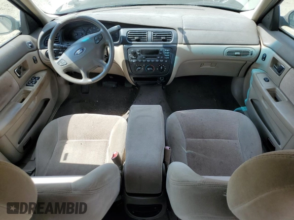 2001 Ford Taurus SE with VIN 1FAFP53U91G108049, listed as a Copart auction lot 55464715 with 85,748 mi miles and Salvage title. Bid and sale history available at DreamBid. Image 8.
