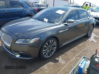 2017 Lincoln Continental Reserve z VIN 1LN6L9RP0H5636532, wystawiony jako IAAI lot #41882280 z przebiegiem 98 733 mil mil oraz . Historia ofert i sprzedaży dostępna na DreamBid. Obrazek 2.