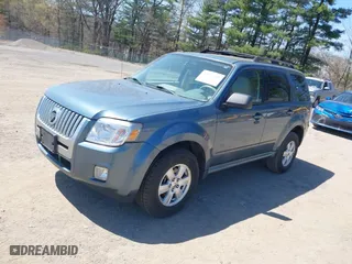 2010 Mercury Mariner with VIN 4M2CN8BG3AKJ01945, listed as a IAAI auction lot 42025848 with 124,617 mi miles. Bid and sale history available at carsss.com. Image 2.