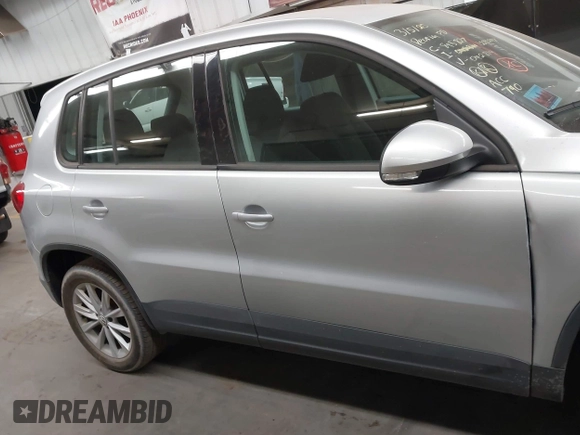 2017 Volkswagen Tiguan S with VIN WVGBV7AX6HK042814, listed as a IAAI auction lot 41742587 with 89,086 mi miles and . Bid and sale history available at DreamBid. Image 13.