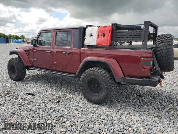 2021 Jeep Gladiator Mojave with VIN 1C6JJTEG9ML552066, listed as a Copart auction lot 63480955 with 55,677 mi miles and Salvage title. Bid and sale history available at DreamBid. Image 2.