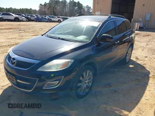 2010 Mazda CX-9 Grand Touring z VIN JM3TB3MV1A0208623, wystawiony jako IAAI lot #41668500 z przebiegiem 226 233 mil mil oraz . Historia ofert i sprzedaży dostępna na DreamBid. Obrazek 2.