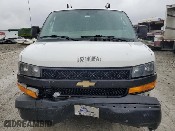 2018 Chevrolet Express Cargo z VIN 1GCWGAFGXJ1291456, wystawiony jako Copart lot #82140854 z przebiegiem 141 829 mil mil oraz Szkoda całkowita • Salvage title. Historia ofert i sprzedaży dostępna na DreamBid. Obrazek 5.