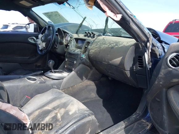 2013 Nissan 370Z z VIN JN1AZ4EH2DM380511, wystawiony jako IAAI lot #41912193 z przebiegiem Nie podano mil oraz . Historia ofert i sprzedaży dostępna na DreamBid. Obrazek 5.