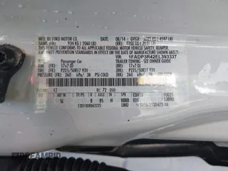 2014 Ford Focus Electric z VIN 1FADP3R42EL393337, wystawiony jako IAAI lot #42365836 z przebiegiem 14 593 mil mil oraz . Historia ofert i sprzedaży dostępna na DreamBid. Obrazek 9.