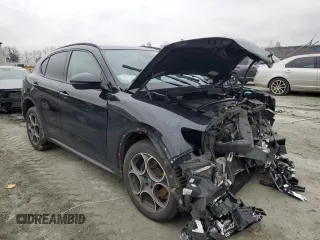 2018 Alfa Romeo Stelvio Sport z VIN ZASFAKPNXJ7B90958, wystawiony jako Copart lot #46043215 z przebiegiem Nie podano mil oraz Szkody całkowita. Historia ofert i sprzedaży dostępna na DreamBid. Obrazek 4.
