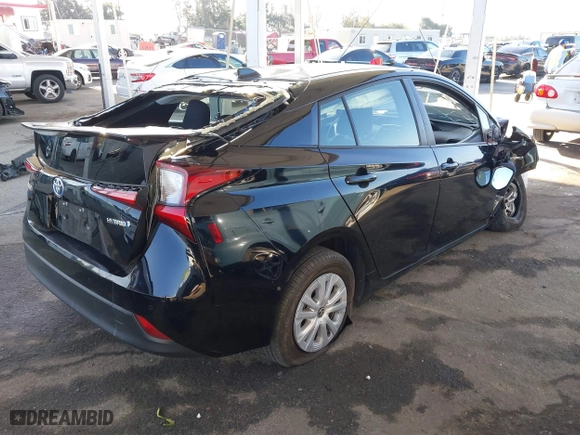 2021 Toyota Prius L Eco with VIN JTDKAMFU2M3134178, listed as a IAAI auction lot 41975477 with 26,936 mi miles. Bid and sale history available at carsss.com. Image 4.