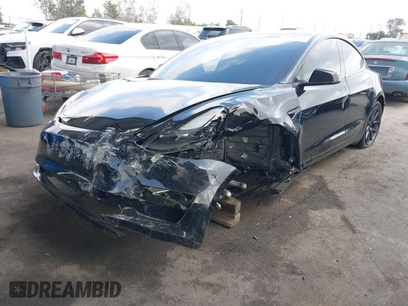 2023 Tesla Model 3 z VIN 5YJ3E1EA1PF546324, wystawiony jako IAAI lot #42103745 z przebiegiem 33 284 mil mil oraz . Historia ofert i sprzedaży dostępna na DreamBid. Obrazek 2.