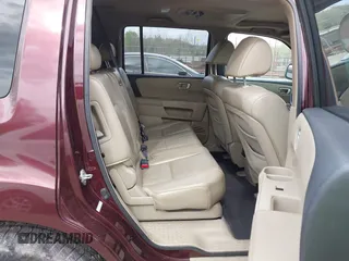 2009 Honda Pilot EX-L with VIN 5FNYF486X9B026041, listed as a IAAI auction lot 41942718 with 219,301 mi miles and . Bid and sale history available at carsss.com. Image 8.