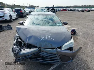 2015 Toyota Camry XLE with VIN 4T4BF1FKXFR465183, listed as a IAAI auction lot 41994681 with 113,891 mi miles and . Bid and sale history available at carsss.com. Image 12.