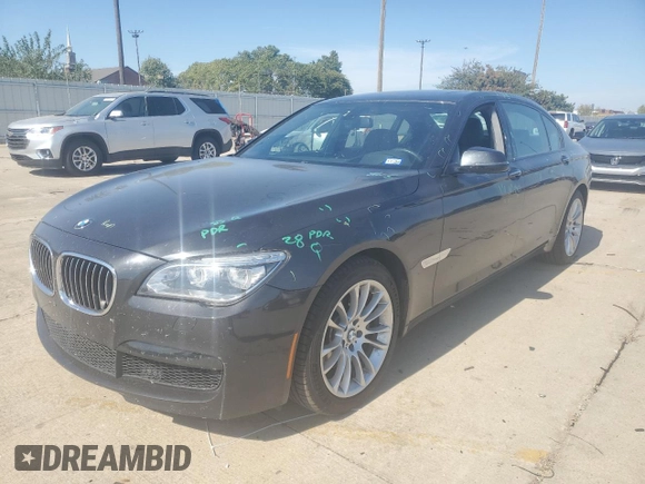2014 BMW 7 Series 740Li with VIN WBAYE4C59ED138376, listed as a Copart auction lot 76878354 with 73,129 mi miles and Salvage Title. Bid and sale history available at carsss.com. Image 1.