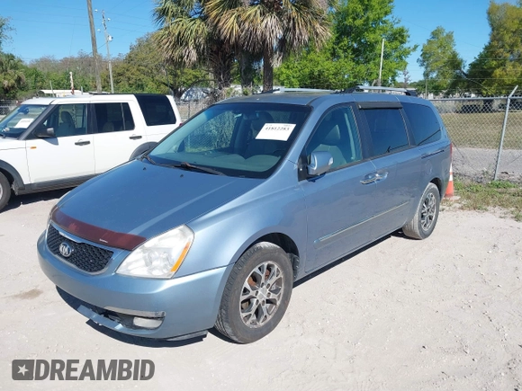 2014 Kia Sedona EX with VIN KNDMH4C70E6553732, listed as a IAAI auction lot 41812283 with 676,894 mi miles. Bid and sale history available at carsss.com. Image 2.