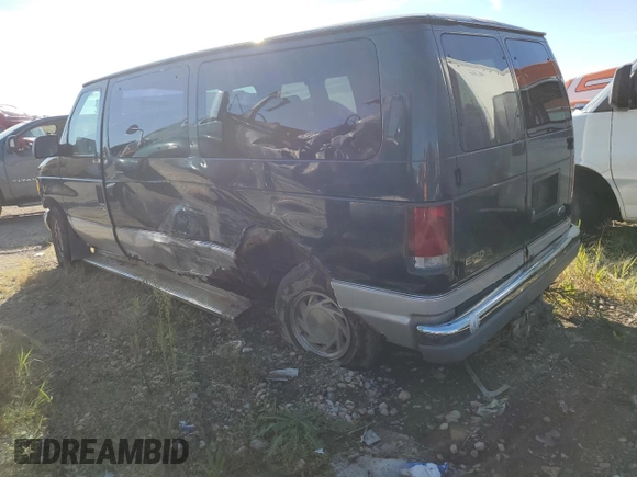 2000 Ford Econoline Passenger XL with VIN 1FMRE11L9YHB19715, listed as a Copart auction lot 69192734 with 237,129 mi miles and Salvage title. Bid and sale history available at DreamBid. Image 2.