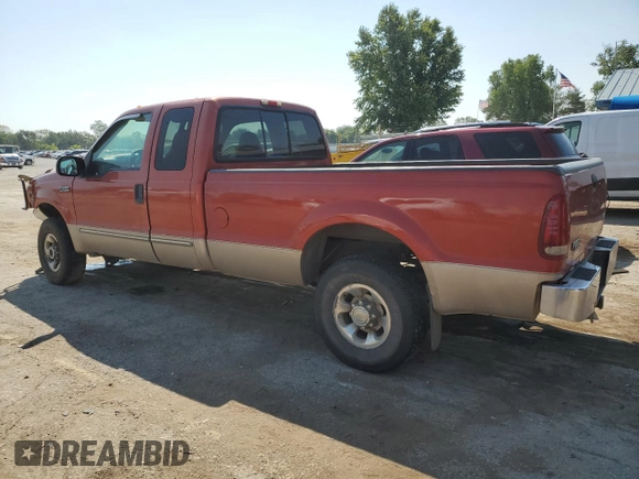 1999 Ford F-250 XL with VIN 1FTNX21SXXEE40026, listed as a Copart auction lot 69888634 with 215,535 mi miles and Salvage title. Bid and sale history available at DreamBid. Image 2.