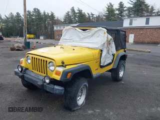 2000 Jeep Wrangler Sport with VIN 1J4FA49S9YP736984, listed as a IAAI auction lot 42055385 with 191,910 mi miles and . Bid and sale history available at DreamBid. Image 12.