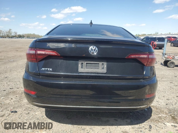2020 Volkswagen Jetta S z VIN 3VWCB7BU9LM027339, wystawiony jako Copart lot #52256125 z przebiegiem 74 549 mil mil oraz Czysty tytuł • Clean title. Historia ofert i sprzedaży dostępna na DreamBid. Obrazek 6.