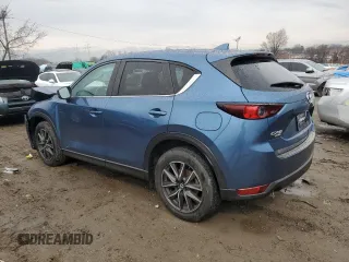 2018 Mazda CX-5 Touring with VIN JM3KFBCM0J0363036, listed as a Copart auction lot 47085755 with 61,928 mi miles and Salvage Title. Bid and sale history available at DreamBid. Image 2.