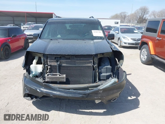 2012 Honda Pilot EX-L with VIN 5FNYF4H52CB085308, listed as a IAAI auction lot 41987301 with 180,877 mi miles and . Bid and sale history available at DreamBid. Image 6.