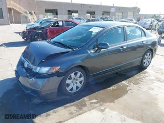 2010 Honda Civic Sdn LX with VIN 2HGFA1F58AH535060, listed as a IAAI auction lot 41667620 with 144,816 mi miles. Bid and sale history available at carsss.com. Image 17.