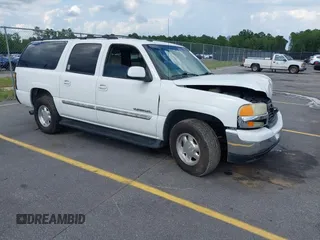2003 GMC Yukon XL SLT z VIN 1GKEC16Z73J266742, wystawiony jako IAAI lot #42480304 z przebiegiem Nie podano mil oraz . Historia ofert i sprzedaży dostępna na DreamBid. Obrazek 1.