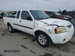2001 Nissan Frontier XE with VIN 1N6DD26S91C398560, listed as a Copart auction lot 87893925 with 184,831 mi miles and Salvage title. Bid and sale history available at DreamBid. Image 4.