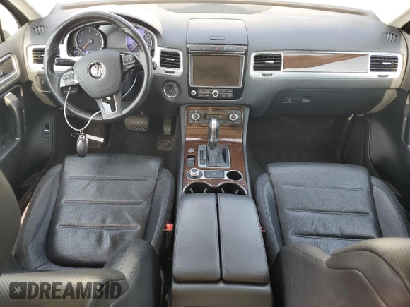 2016 Volkswagen Touareg Sport z VIN WVGEP9BPXGD005351, wystawiony jako Copart lot #60719065 z przebiegiem 133 674 mil mil oraz Czysty tytuł • Clean title. Historia ofert i sprzedaży dostępna na DreamBid. Obrazek 8.