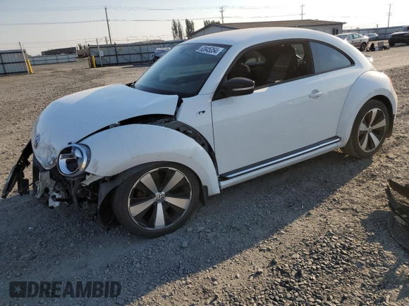 2016 Volkswagen Beetle Turbo R-Line with VIN 3VWVT7AT9GM602303, listed as a Copart auction lot 63845354 with 65,796 mi miles and Salvage Title. Bid and sale history available at DreamBid. Image 1.