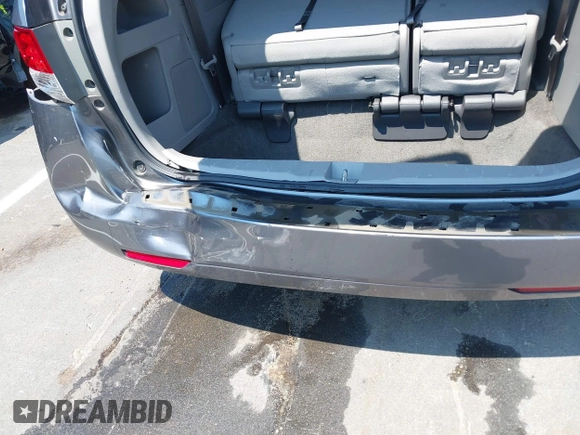 2014 Honda Odyssey EX-L with VIN 5FNRL5H63EB073585, listed as a IAAI auction lot 42673004 with 119,971 mi miles and . Bid and sale history available at DreamBid. Image 18.