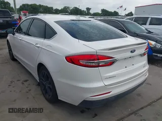 2020 Ford Fusion SE with VIN 3FA6P0HD7LR148007, listed as a IAAI auction lot 42132944 with 63,328 mi miles and . Bid and sale history available at DreamBid. Image 3.