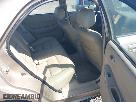 1999 Mazda 626 ES z VIN 1YVGF22C5X5811946, wystawiony jako IAAI lot #41970165 z przebiegiem 126 709 mil mil oraz . Historia ofert i sprzedaży dostępna na DreamBid. Obrazek 8.