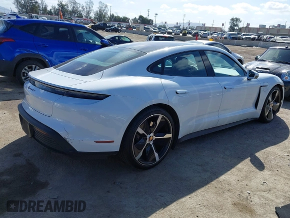 2021 Porsche Taycan 4S z VIN WP0AB2Y12MSA43873, wystawiony jako IAAI lot #41703233 z przebiegiem 24 452 mil mil oraz . Historia ofert i sprzedaży dostępna na DreamBid. Obrazek 4.