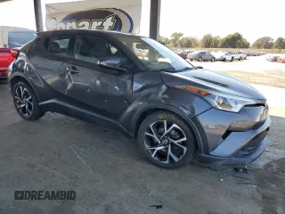 2018 Toyota C-HR XLE with VIN NMTKHMBXXJR025925, listed as a Copart auction lot 60121105 with 107,081 mi miles and Salvage title. Bid and sale history available at DreamBid. Image 4.
