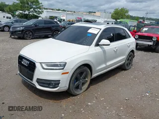 2015 Audi Q3 Premium Plus z VIN WA1EFCFS8FR001278, wystawiony jako IAAI lot #42475043 z przebiegiem 125 417 mil mil oraz . Historia ofert i sprzedaży dostępna na DreamBid. Obrazek 23.