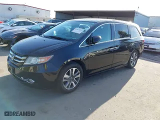 2015 Honda Odyssey Touring Elite with VIN 5FNRL5H93FB065594, listed as a IAAI auction lot 41826693 with 94,632 mi miles. Bid and sale history available at carsss.com. Image 2.