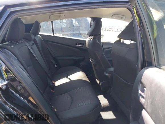 2021 Toyota Prius L Eco with VIN JTDKAMFU6M3135799, listed as a IAAI auction lot 42064241 with 77,120 mi miles and . Bid and sale history available at DreamBid. Image 8.