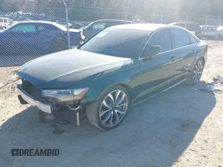 2012 Audi A6 3.0T Prestige with VIN WAUHGAFC8CN160010, listed as a IAAI auction lot 41794692 with 117,897 mi miles. Bid and sale history available at carsss.com. Image 2.