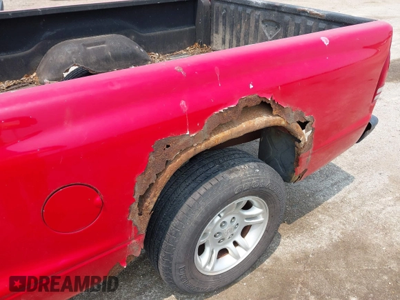 2004 Dodge Dakota z VIN 1D7FL16K34S533380, wystawiony jako IAAI lot #42469766 z przebiegiem 169 815 mil mil oraz . Historia ofert i sprzedaży dostępna na DreamBid. Obrazek 6.